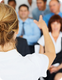 trainer addressing a meeting