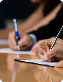 attendees completing a training questionnare